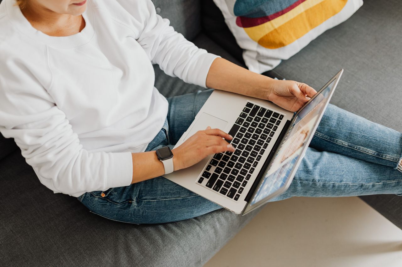 Someone working privately on a laptop at home